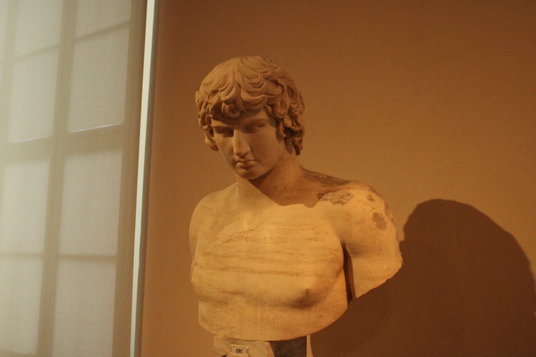 Bust of a young man with curly hair