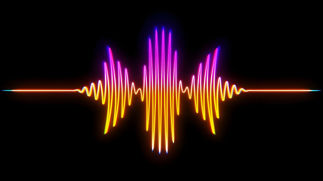 A colorful sound wave on a black background