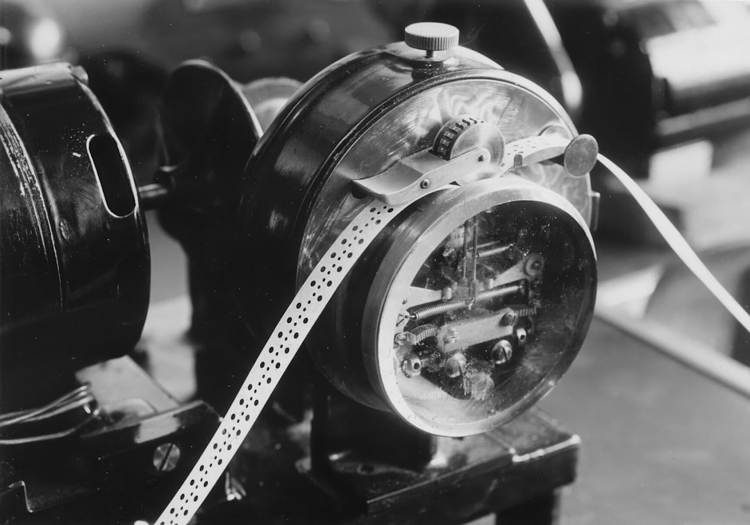 Vintage film projector with perforations on film strip